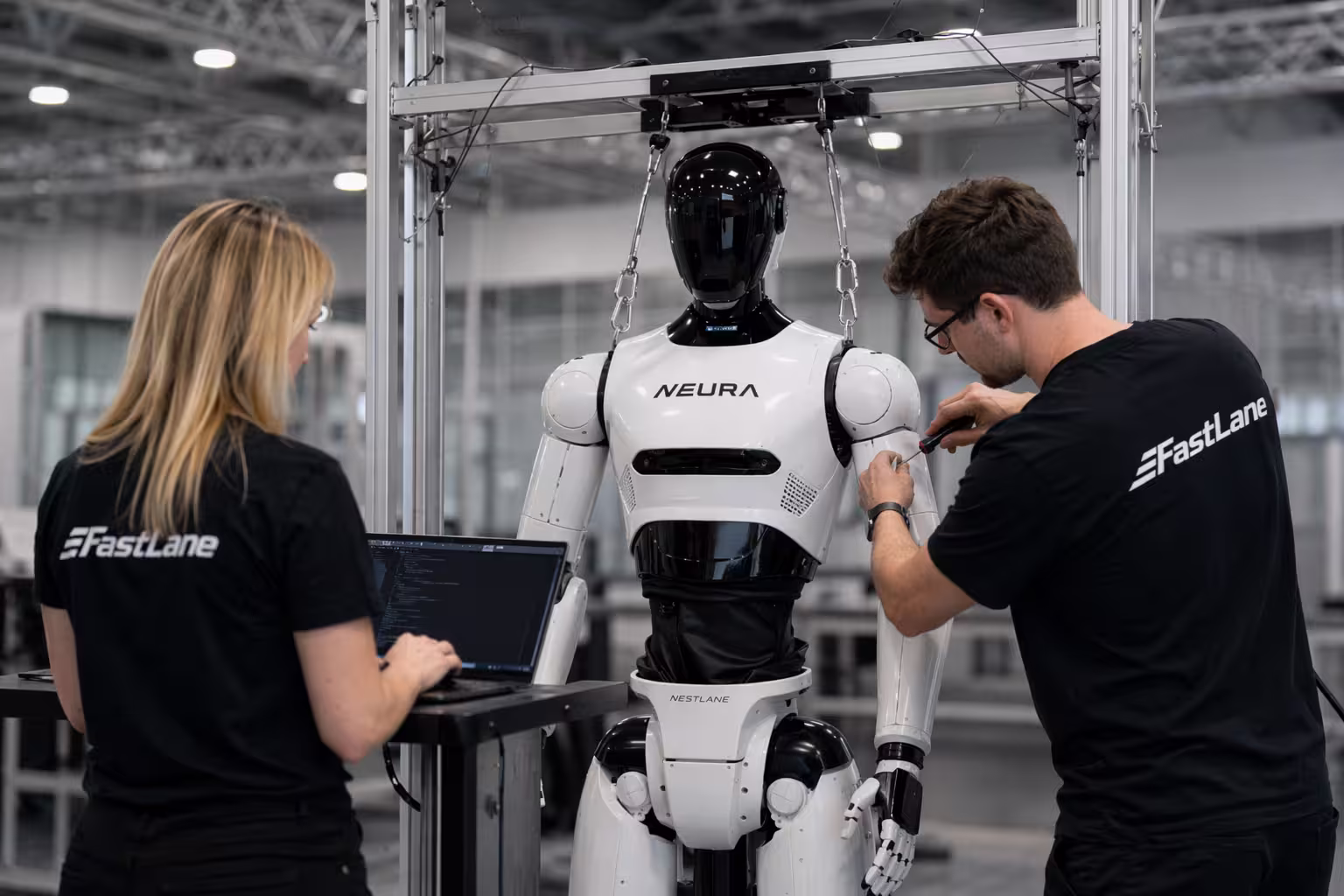 FastLane Robotics team calibrating a humanoid retail robot
